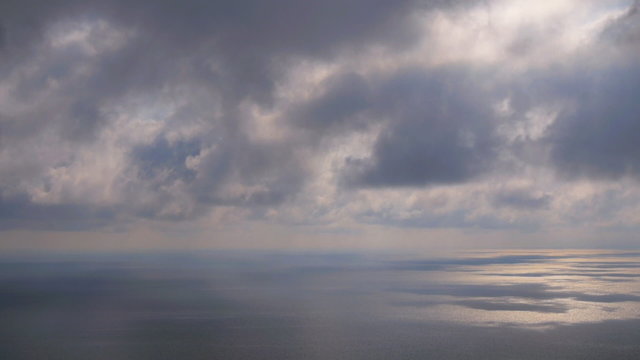 Movement of the clouds over the sea (time-lapse)
