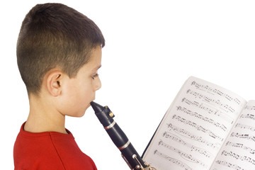 Young boy playing the clarinet