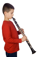 Young boy playing the clarinet