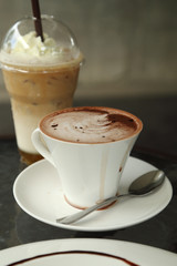 cup of hot chocolate with ice coffee