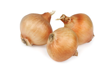 Three onions isolated on white background