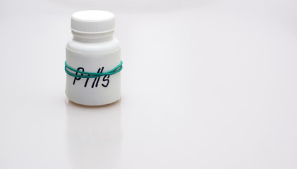 Plastic bottle with pills