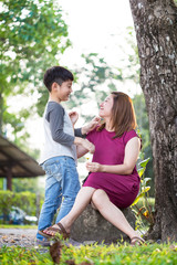 Fototapeta premium Happy Asian family ,mother with her son at park