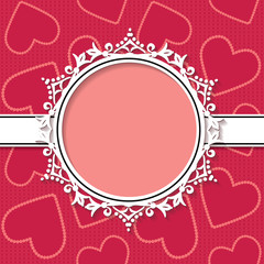 Paper frame on red pattern with hearts.