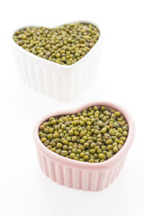 Green mung beans isolated on white background