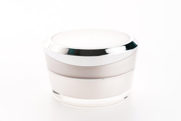 Cosmetic cream bottle isolated on white background