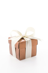Gold gift box isolated on white background