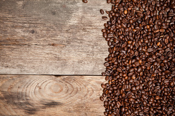 Coffee beans on wood table