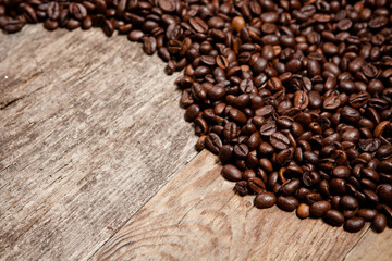 Coffee beans on wood table