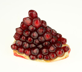 Cloese-up of slice of pomegranate with seeds