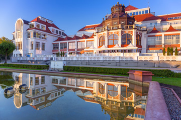 Baltic architecture of Sopot reflected in the fountain, Poland
