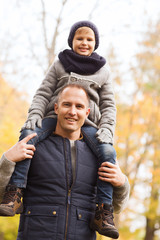 happy family having fun in autumn park