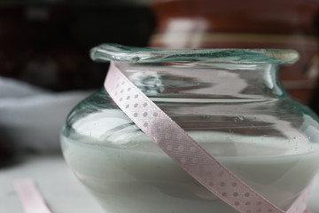 A glass vintage milkpot and ceramics crockery