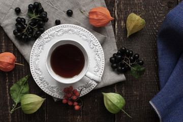 Tea cup and ground-cherry