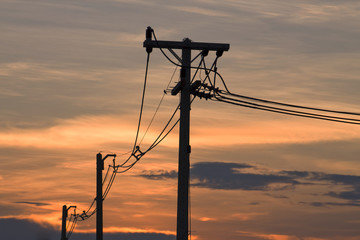 Silhouettes of the power lines and wires