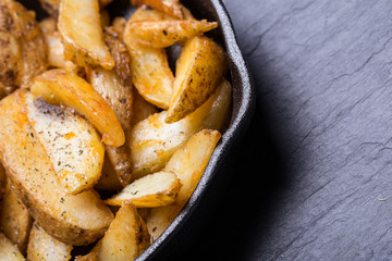 Fried potato wedges 