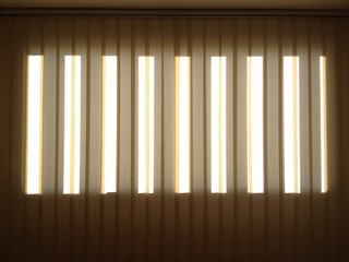 Light seeping through window curtains