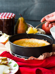 the process of making apple tart, hands