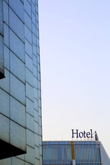 Obraz premium Hotel sign on the top of modern building
