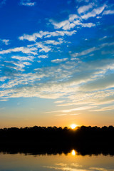 sunset on the river.  dramatic sunset over a lake