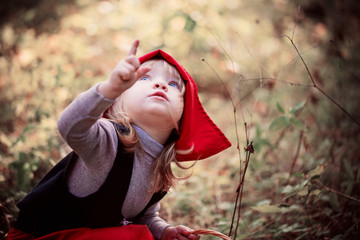 Little Red Riding Hood in the woods