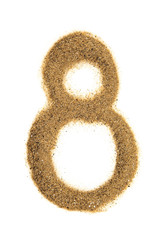 Number 8 made of sand isolated on white