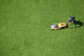 A man mowing the lawn