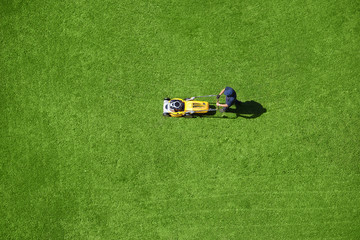 A man mowing the lawn