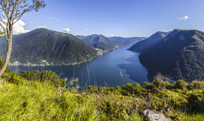 Naklejka na ściany i meble Panoramic view of Lake Como from the small town of Pigra