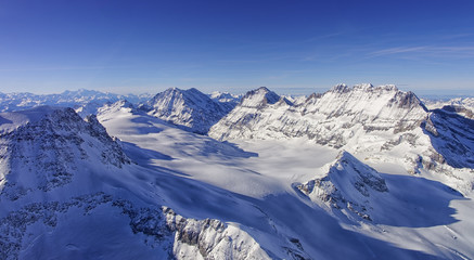 Fototapeta na wymiar Ice flow Valley in Jungfrau region helicopter view in winter