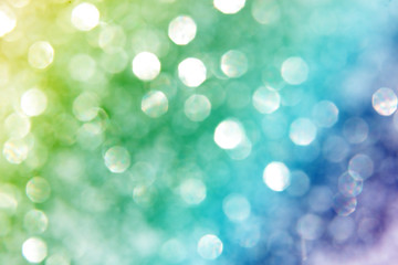 Fototapeta premium Abstract blurred glittering sparkling background. Lights on gold, silver background.