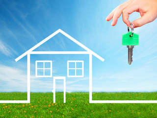 Hand with a house key.