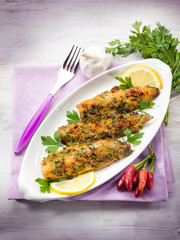 fish fillet with  hot chili pepper and parsley