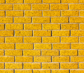 The yellow brick wall texture and little black spot, use as back