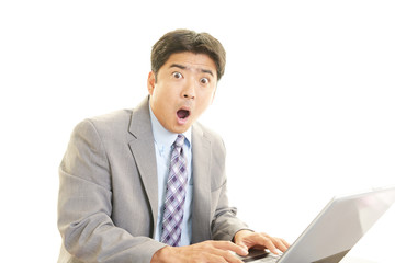 驚いた表情のビジネスマン