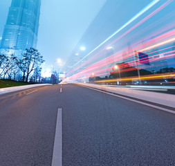 Asphalt road and modern city