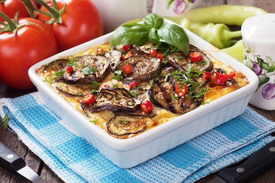 Moussaka dish with aubergine and chili pepper