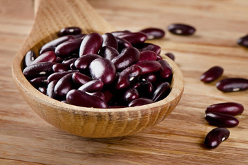 Kidney beans on  a wooden table