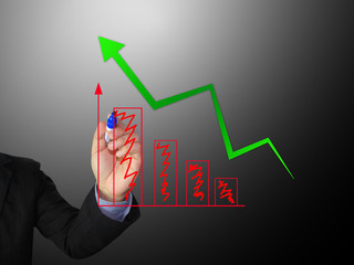 Male hand drawing a graph