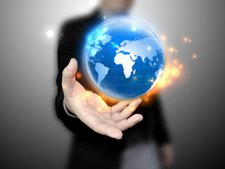 Businessman holding a globe