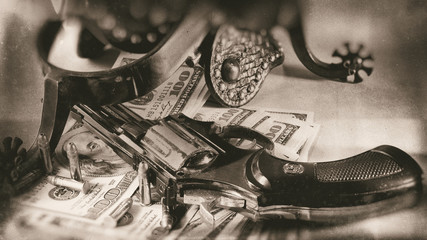 The spurs. The Colt. The bucks. Abstract wealth and money retro