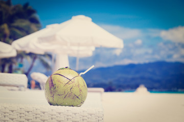 coconut drink on sand beach