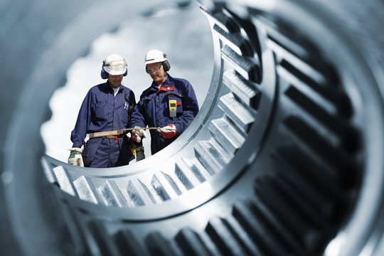 mechanics seen through a large cogwheels drum