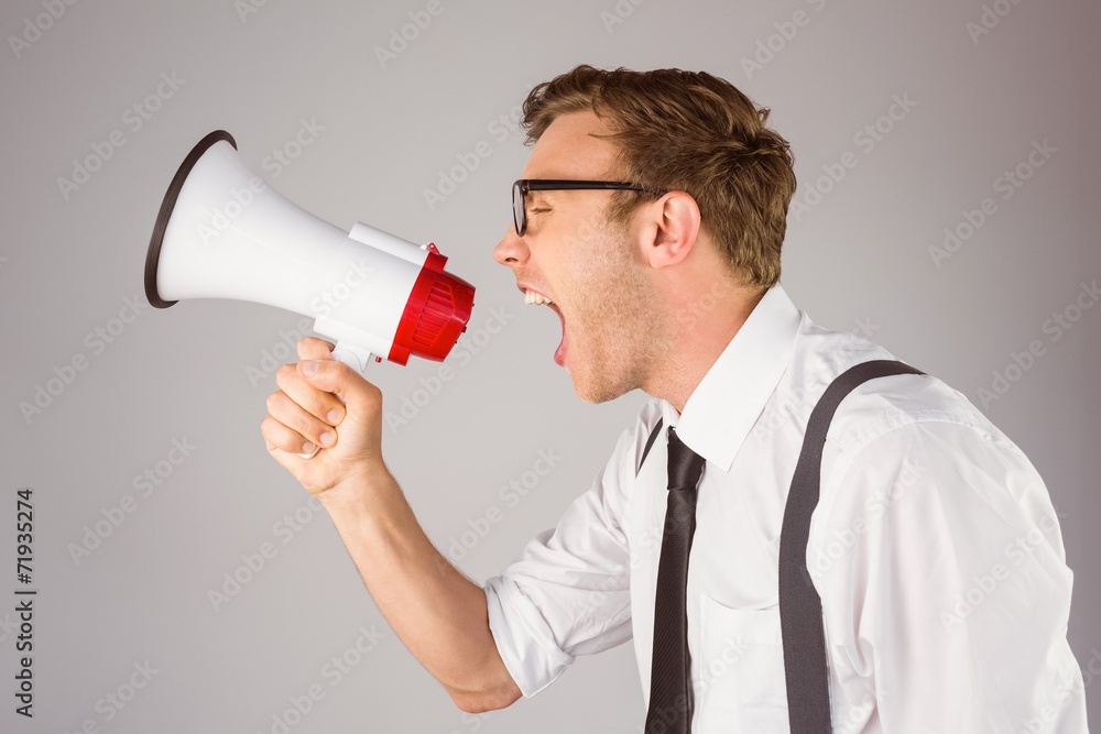 Poster geeky businessman shouting through megaphone
