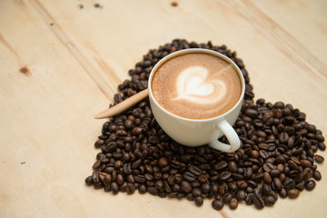 Cup of coffee with heart shape