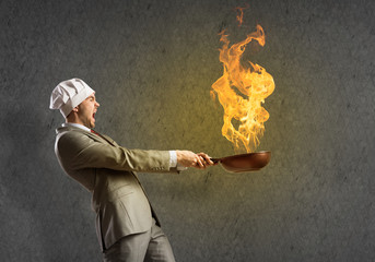 Businessman with pan