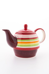 Colorful tea pot isolated on white background