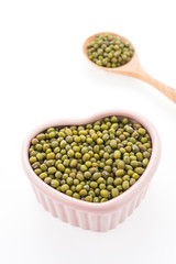 Green mung beans isolated on white background
