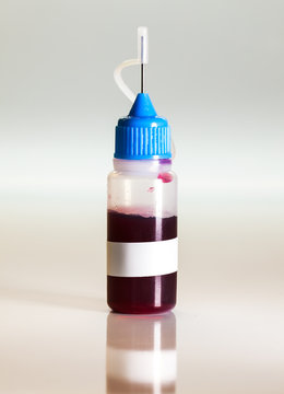 Plastic bottle with blood sample, doping medical concept