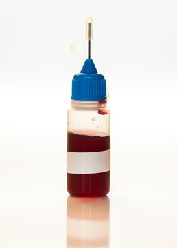 Plastic bottle with blood sample, doping medical concept
